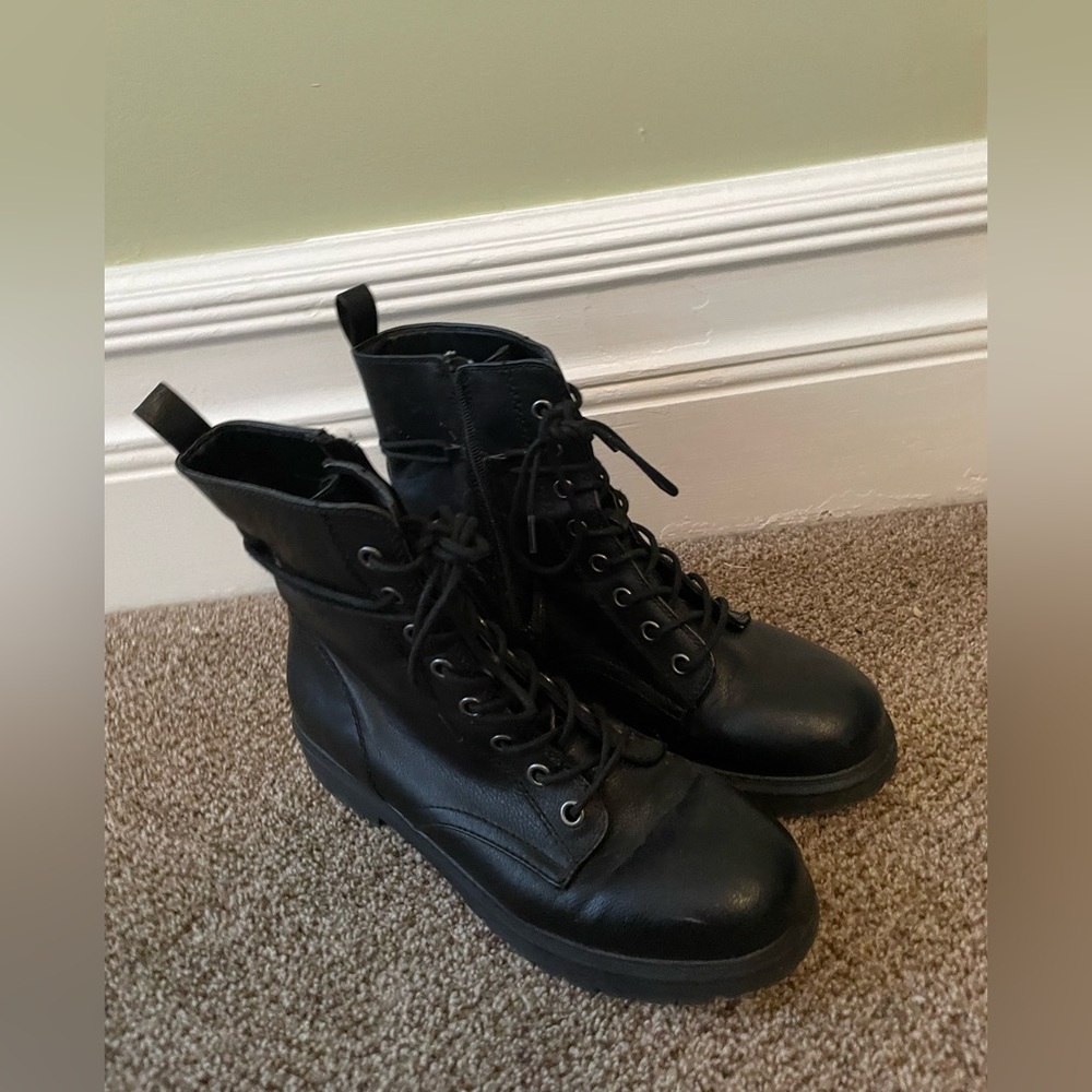 Black leather combat boots